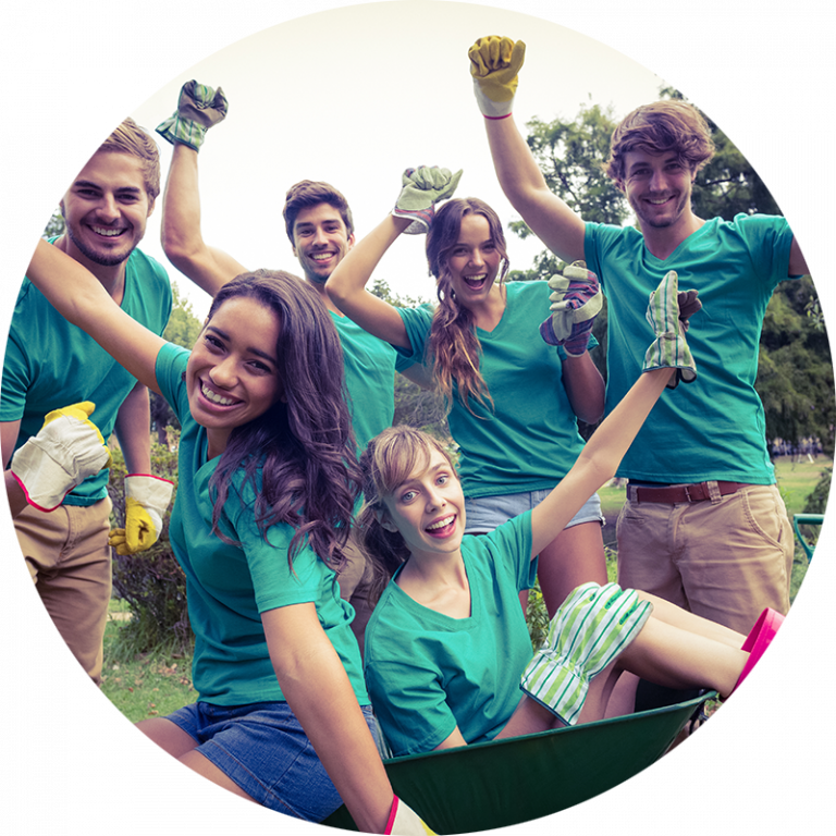 young adult gardeners and garden volunteers excited about gardening