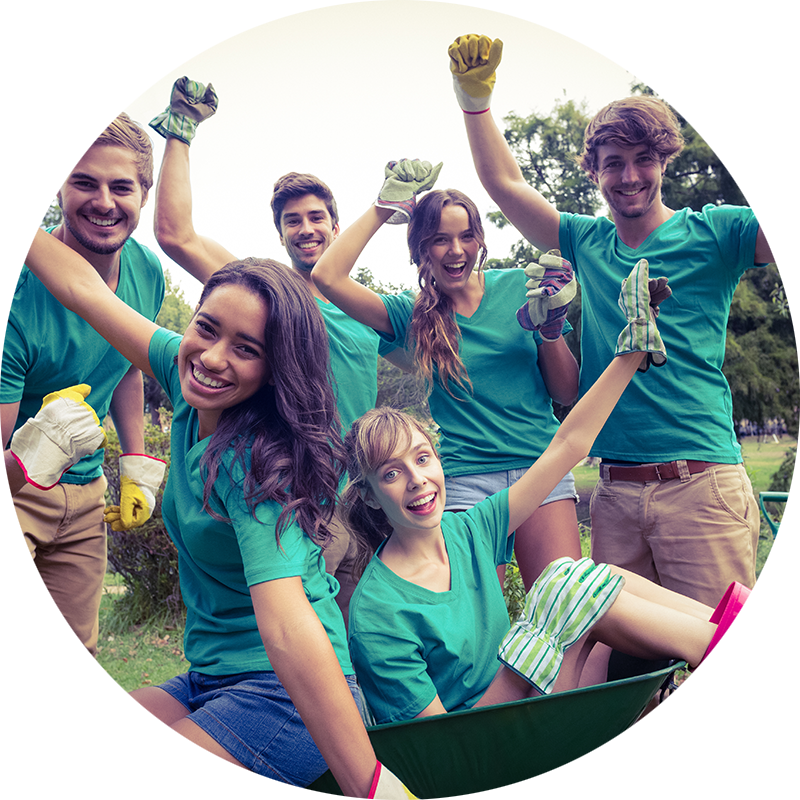 young adult gardeners and garden volunteers excited about gardening