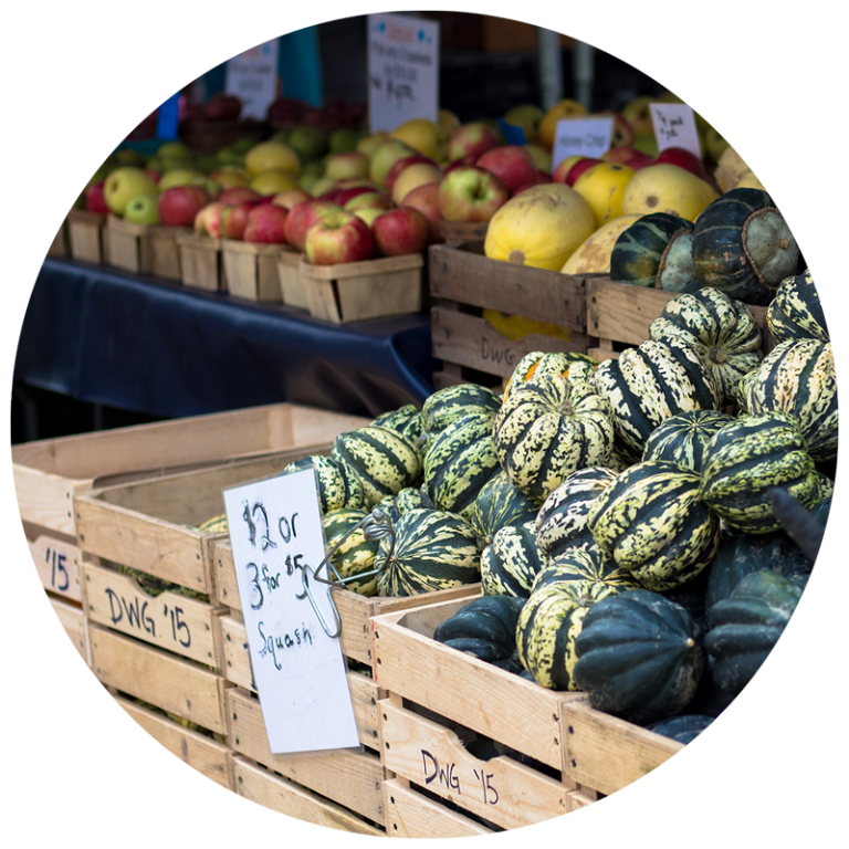 vegetables in crates at a farmers market