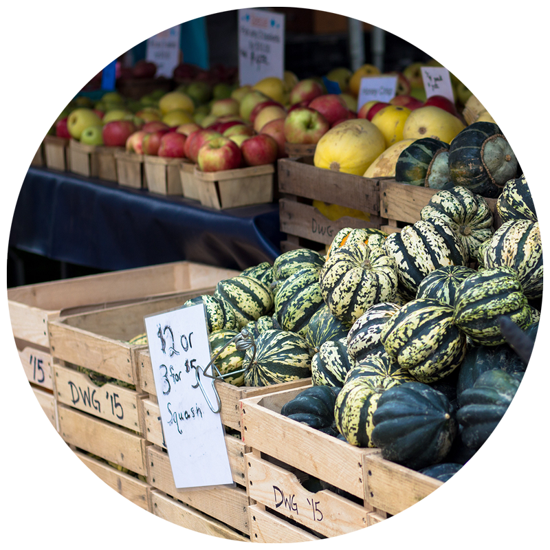 vegetables in crates at a farmers market