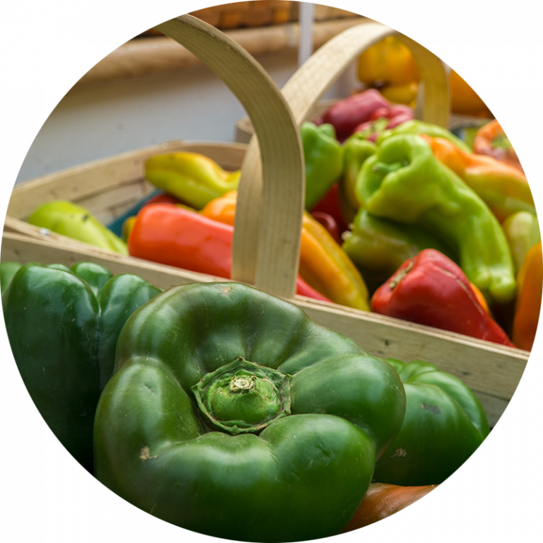 variety of peppers in baskets