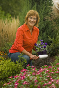 Melinda with shovel in garden High Res Melinda Myers