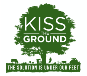 green tree with white words "kiss the ground" and then "the solution is under our feet"