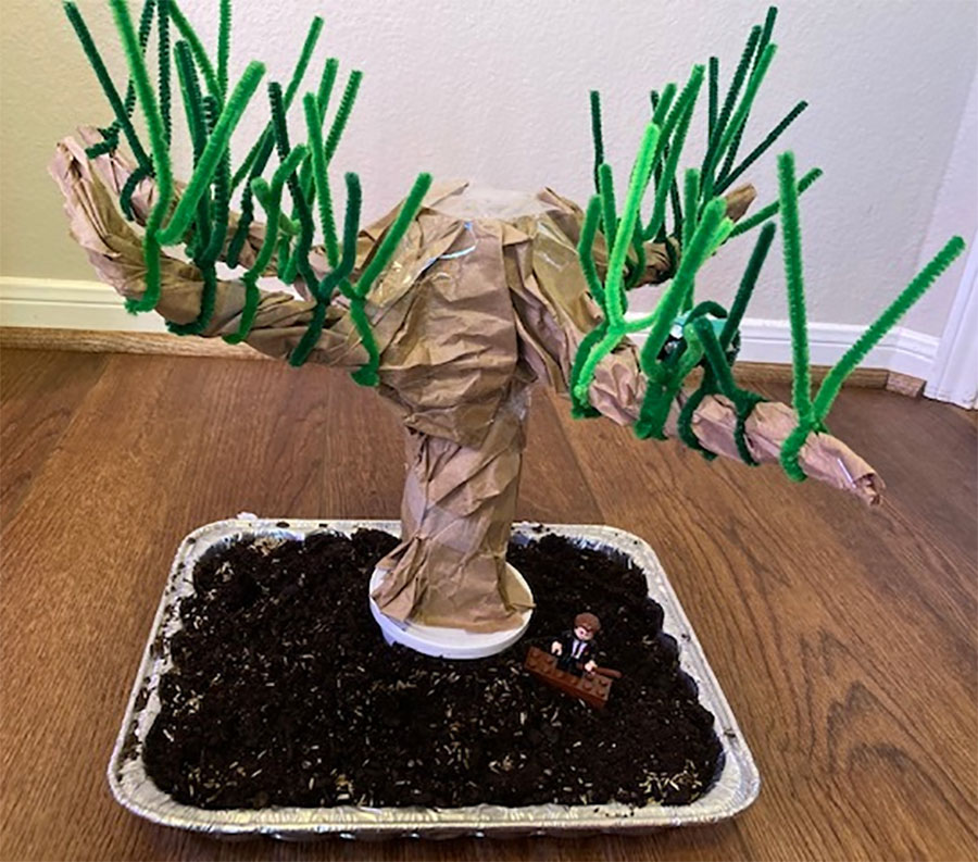 diorama of a tree made with paper and pipe cleaners