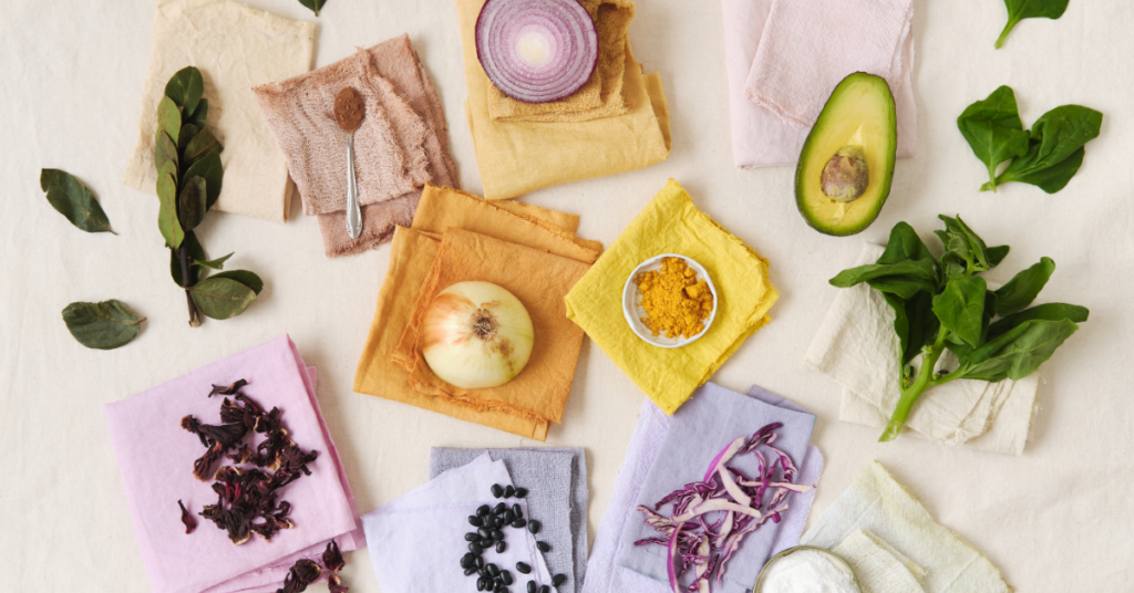 Various plant parts on lightly colored pieces of fabric