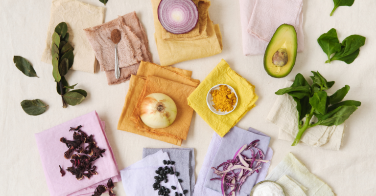 Various plant parts on lightly colored pieces of fabric