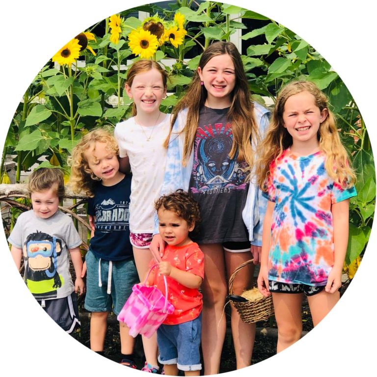 A group of kids in a range of ages and sizes