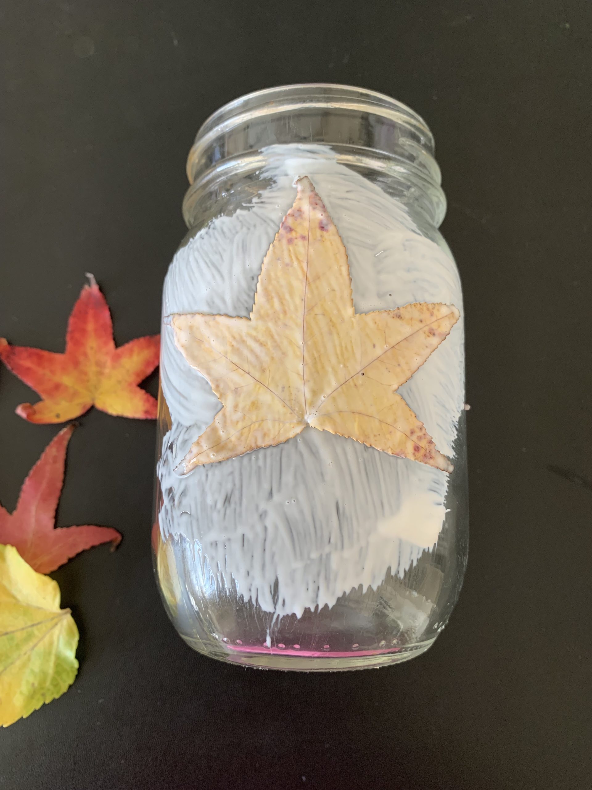 A leaf sealed onto a jar
