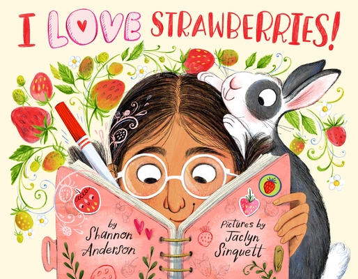 The cover of the book I Love Strawberries, which shows a child with glasses looking at a pink book while a bunny hovers over their shoulder