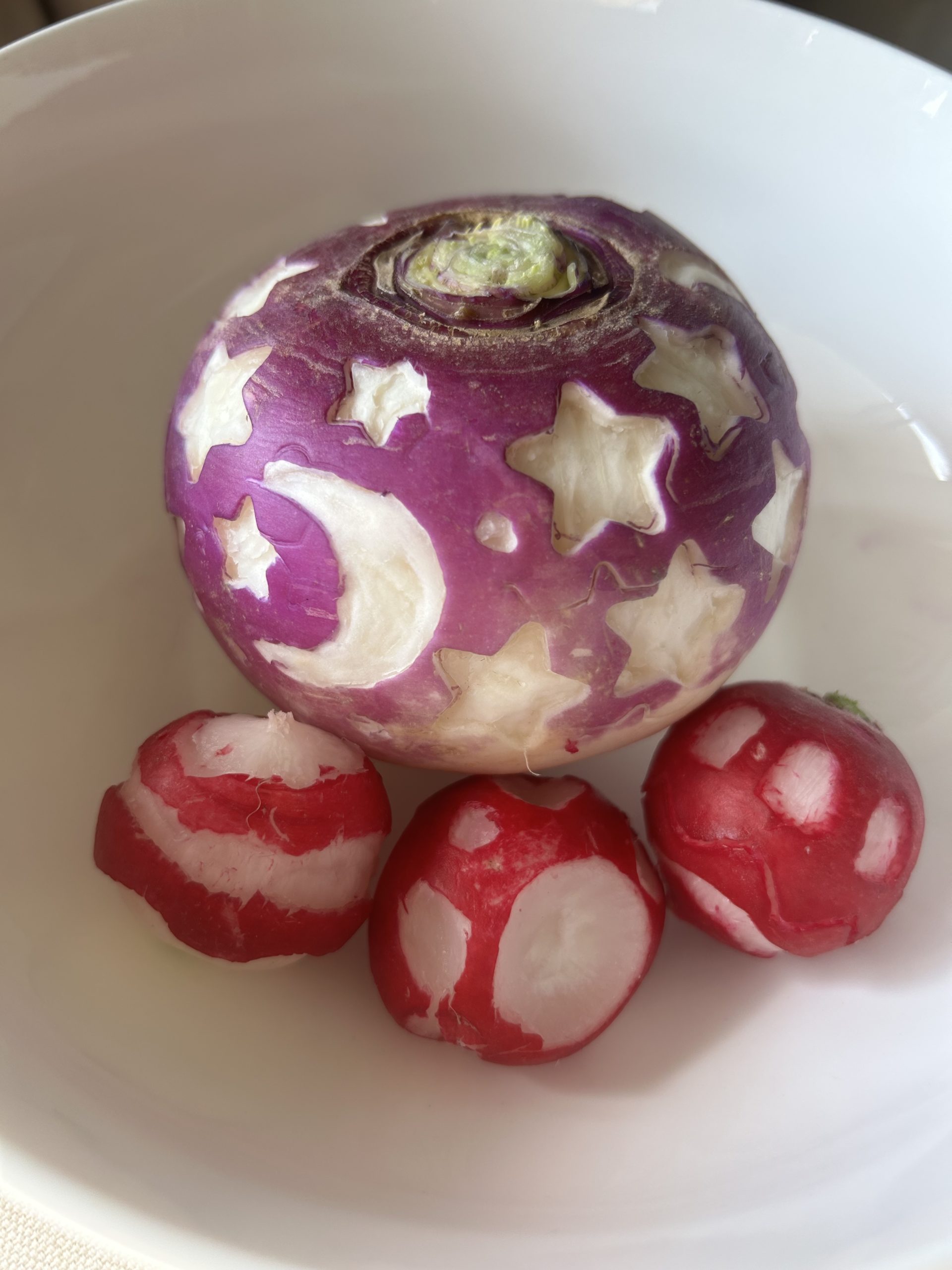 Carved radishes and a carved turnip