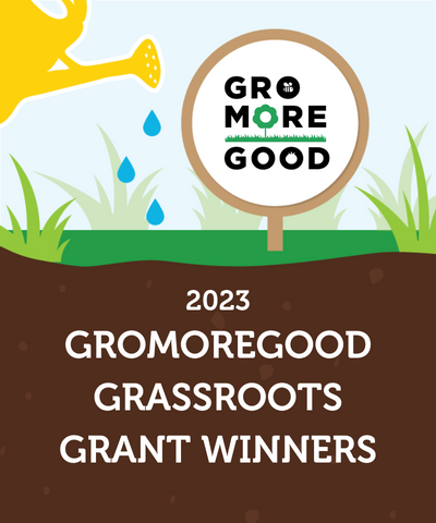 A sign that reads "2023 GroMoreGood Grassroots Grant Winners" It looks like a yellow watering can sprinkling water on brown soil.